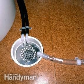 Laundry room plumbing: A recessed PVC floor drain | The Family Handyman