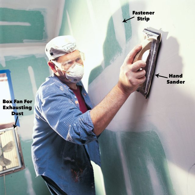 sand drywall with hand sander