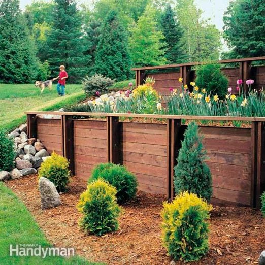 How To Build A Treated Wood Retaining Wall Diy Family Handyman - Building Wooden Retaining Wall On Slope