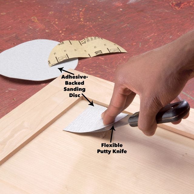 putty knife to sand tight spots