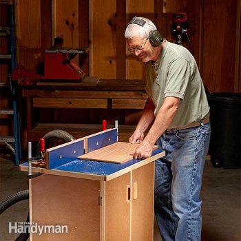man operates a simple table router