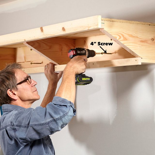 secure garage shelf to the wall