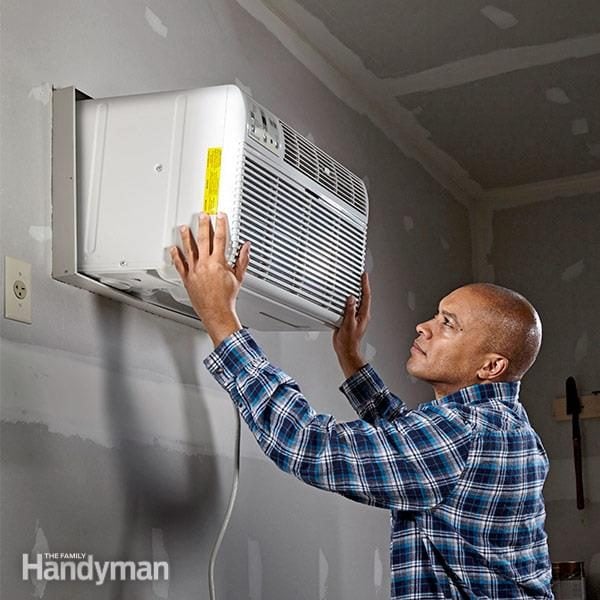 Installing A Garage Air Conditioner Diy Family Handyman - Who Installs Through The Wall Ac Units