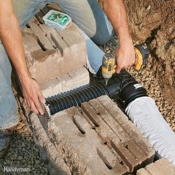 Provide plenty of drainage between landscape retaining wall blocks