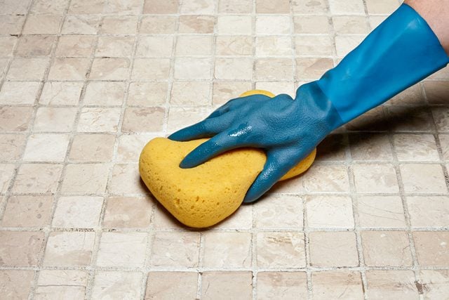 How To Whiten Grimy Grout, Cleaning Tiles with Sponge with Hand wearing Rubber Gloves