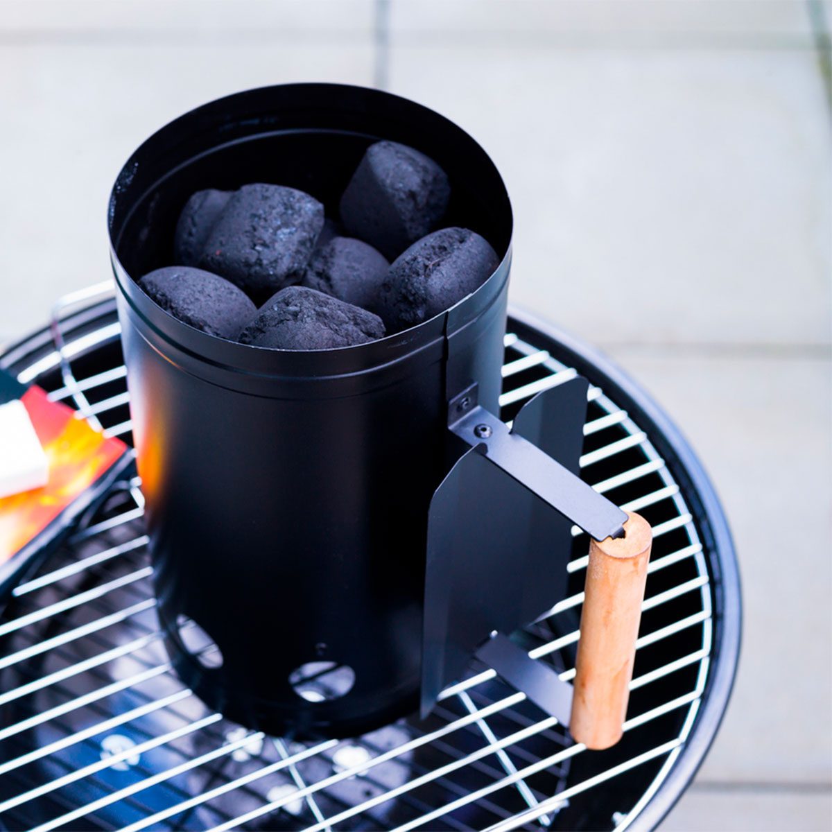 charcoal chimney with black charcoal