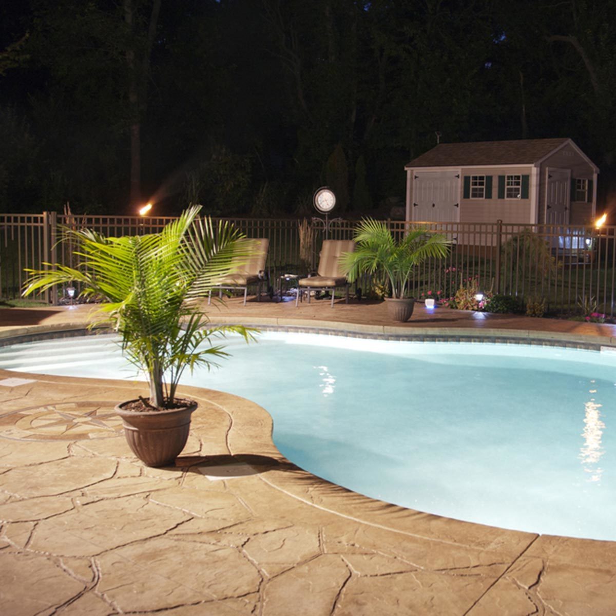stamped concrete patio swimming pool