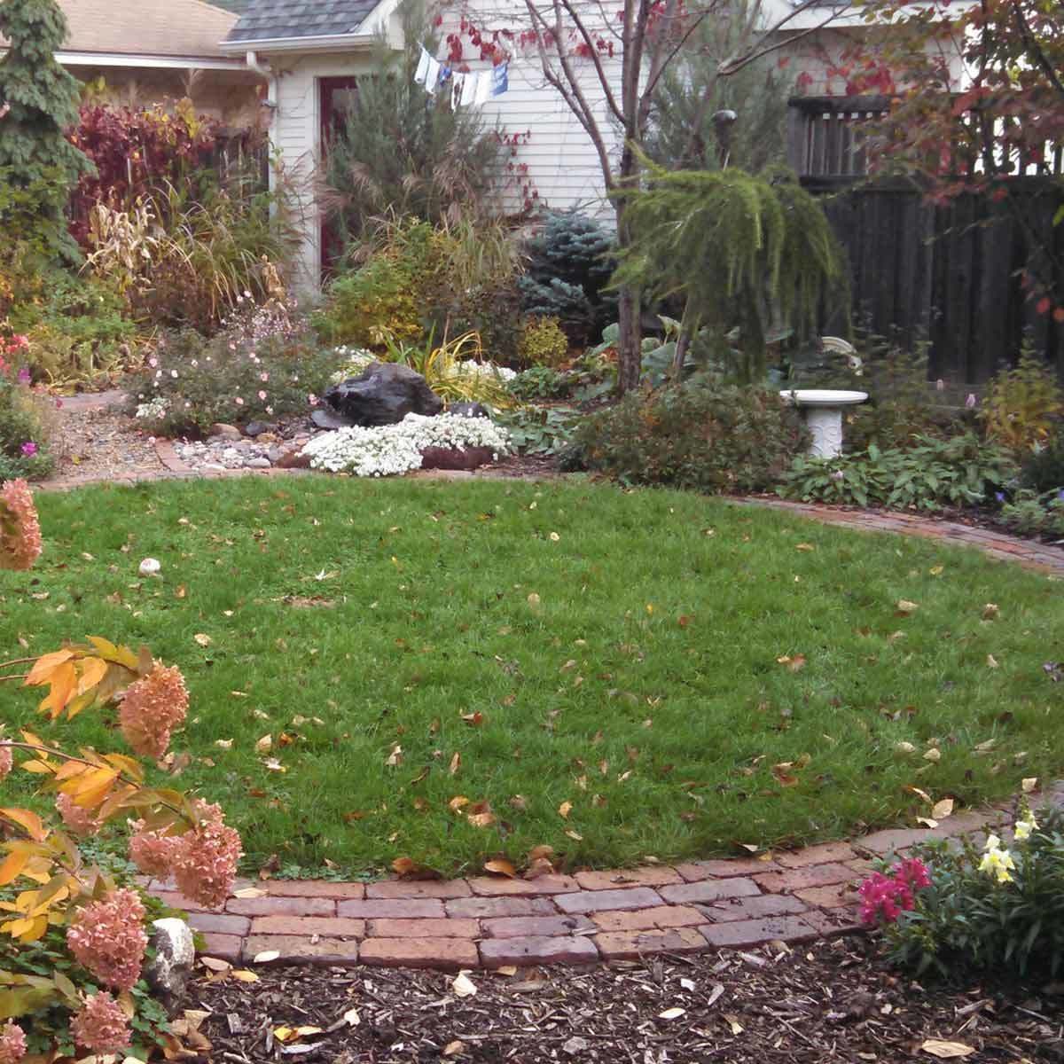 Brick and Grass Courtyard Patio