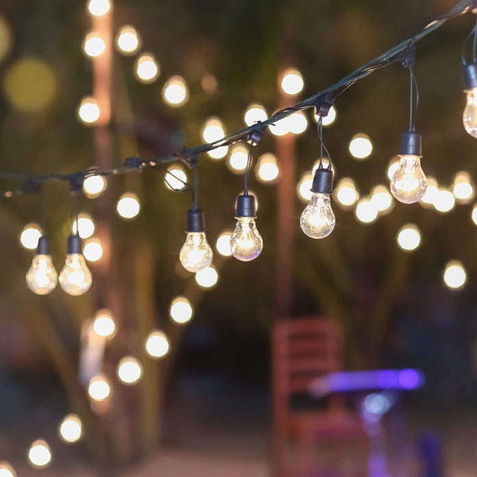 outdoor string lights Edison bulbs make shift canopy