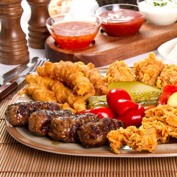 Multiple Food Stations plate full of barbecued foods