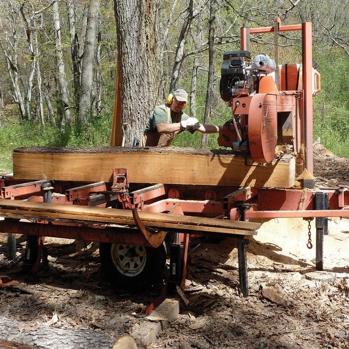 Planing lumber on a massive machine | Construction Pro Tips