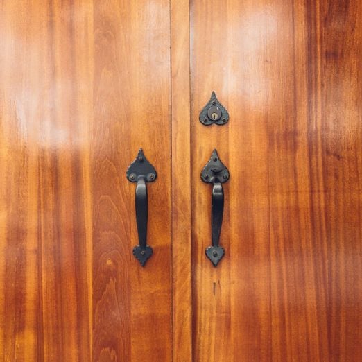 Wooden doors with decorative door handles, polyurethane wood finish