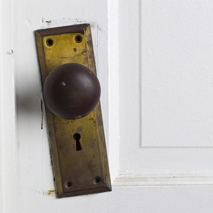 shutterstock_10664512 loose door knob home repair fix it