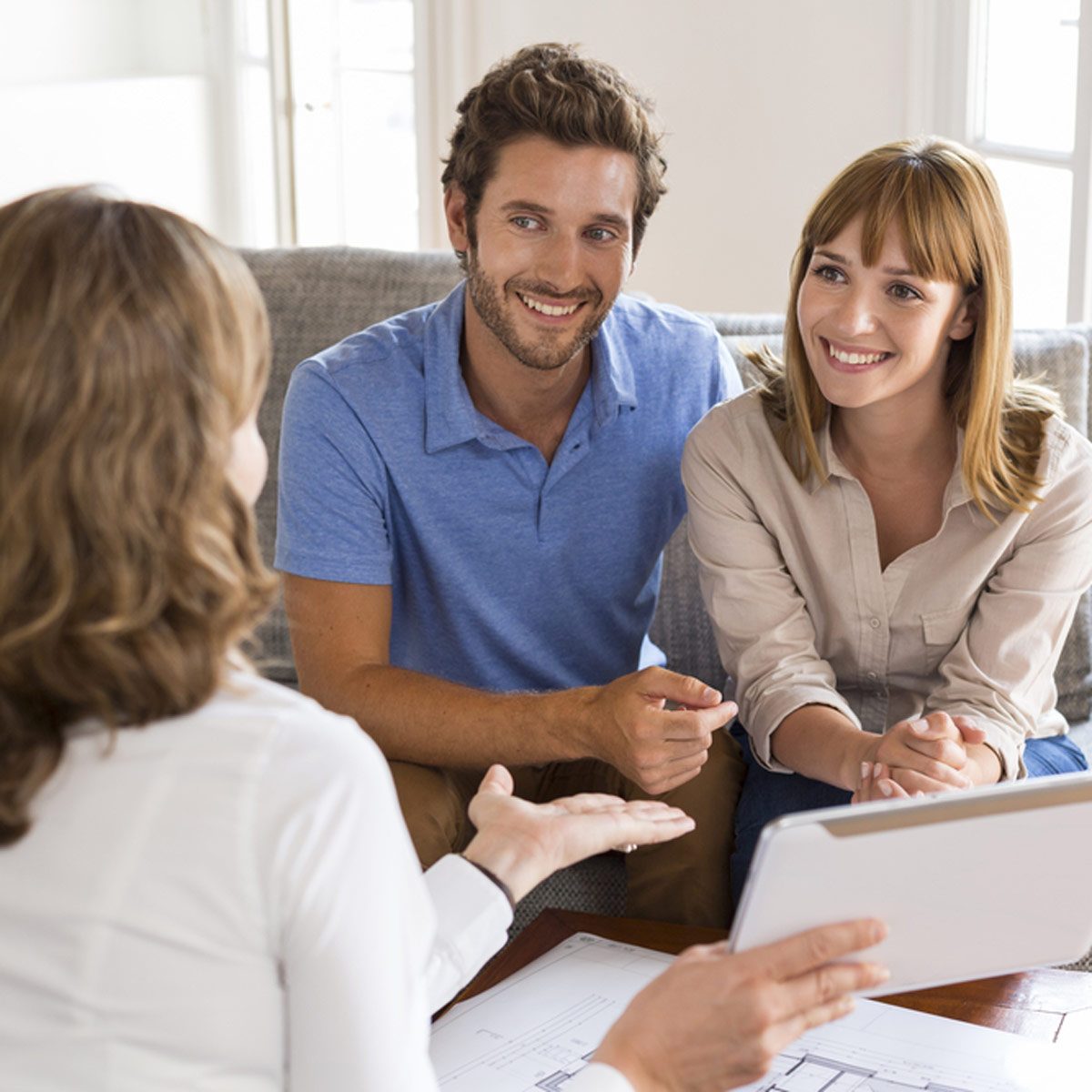 shutterstock_326432795 man and women talking with a realtor home inspector financial advice contractor research
