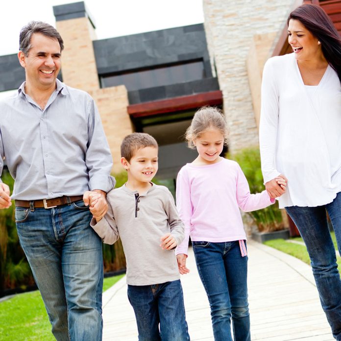 shutterstock_98814356-1200x1200 family happily walking and holding hands buying a home smart homeowner