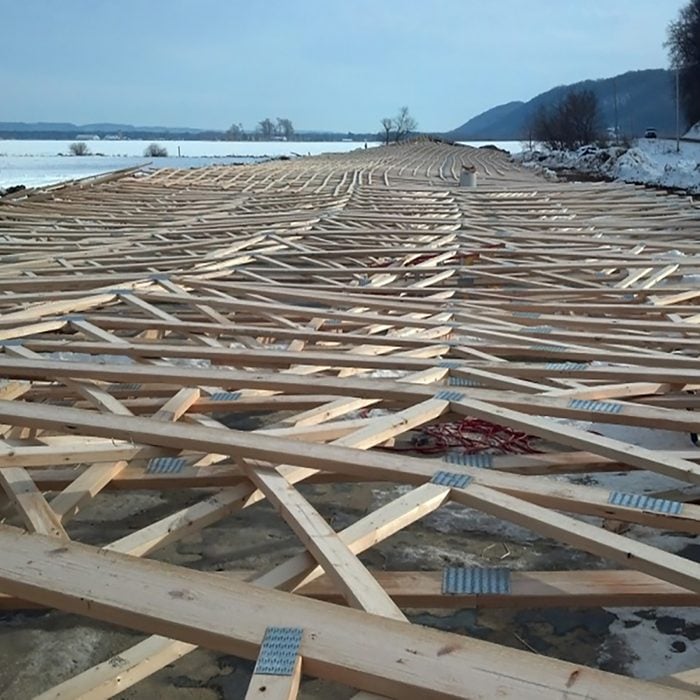 Piles and piles of collapsed trusses | Construction Pro Tips
