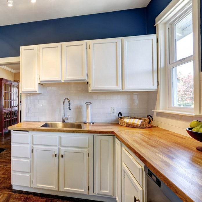 17oct912018_206792290_07 blue kitchen with white cabinets butcher block counter tops