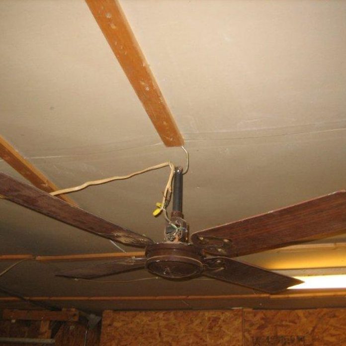Hanging-Fan hung by electrical cable and hanger