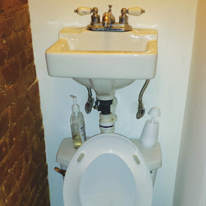 sink on top of toilet