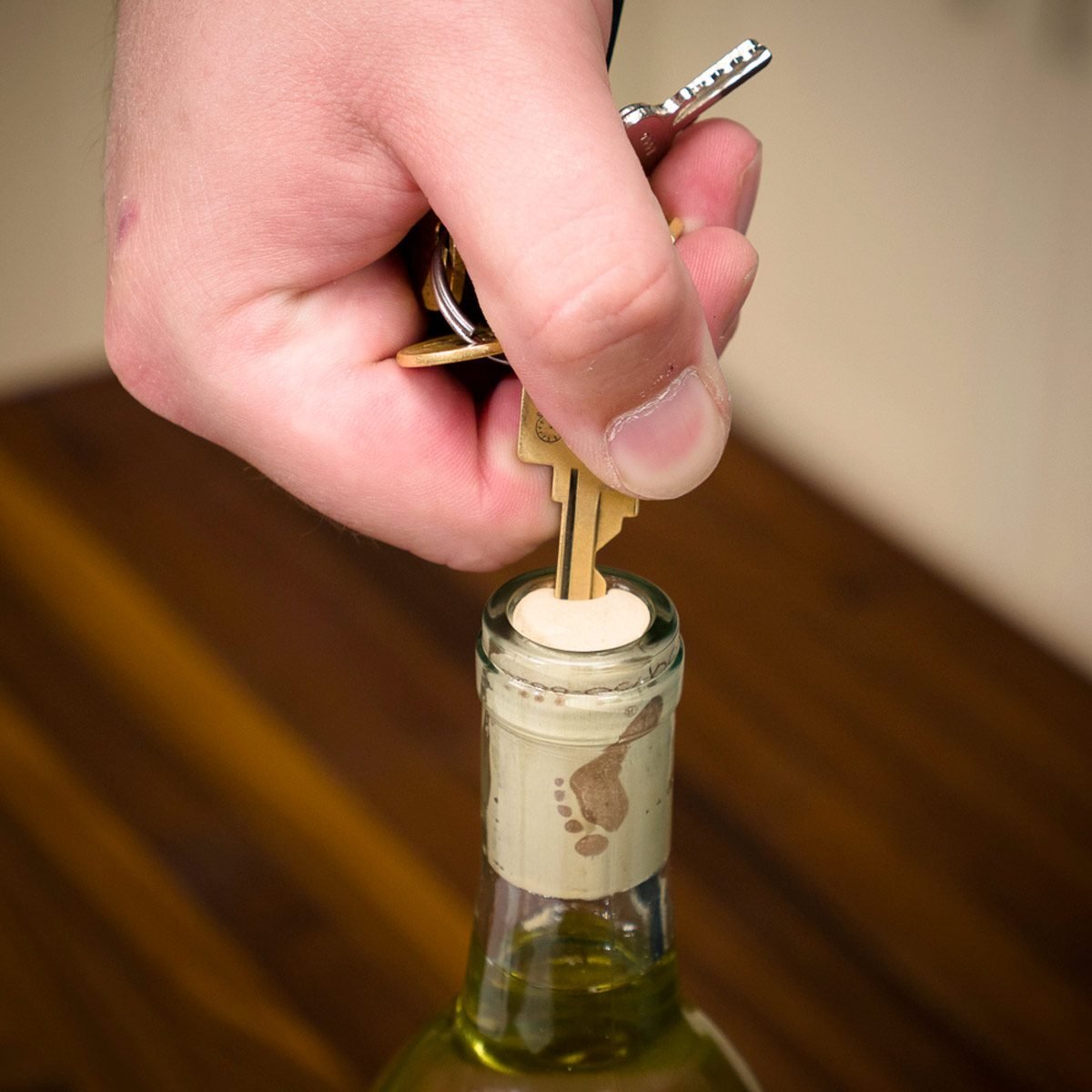 Open Wine Bottle With a Key
