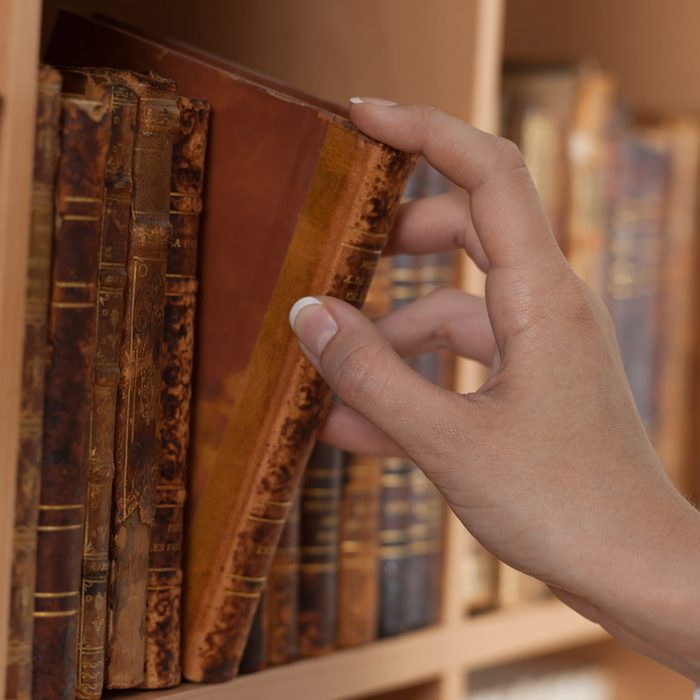 shutterstock_54512773 hidden bookcase secret opening old books