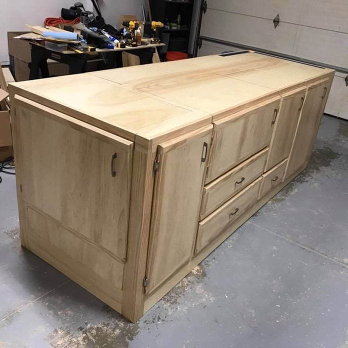 workbench with tools flipped into storage cabinets