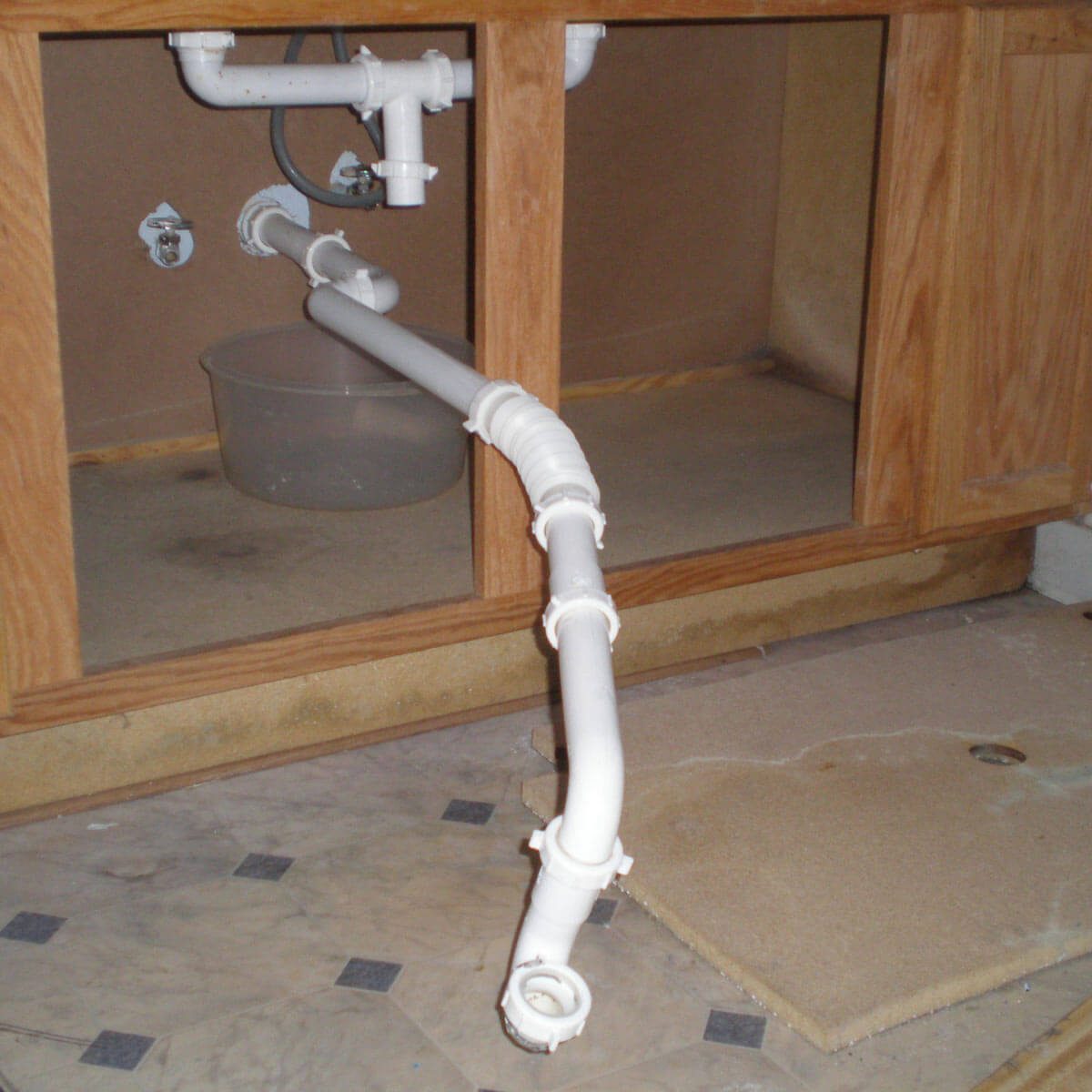 Roughing in for a centrally located sink