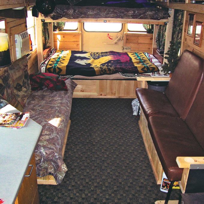 Inside of school bus turned into cabin