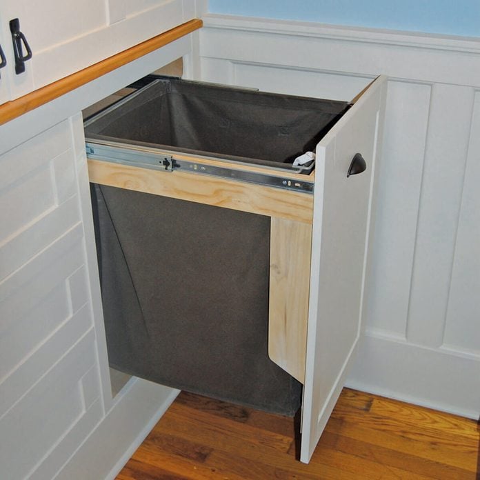 laundry room ideas Slide out laundry hamper