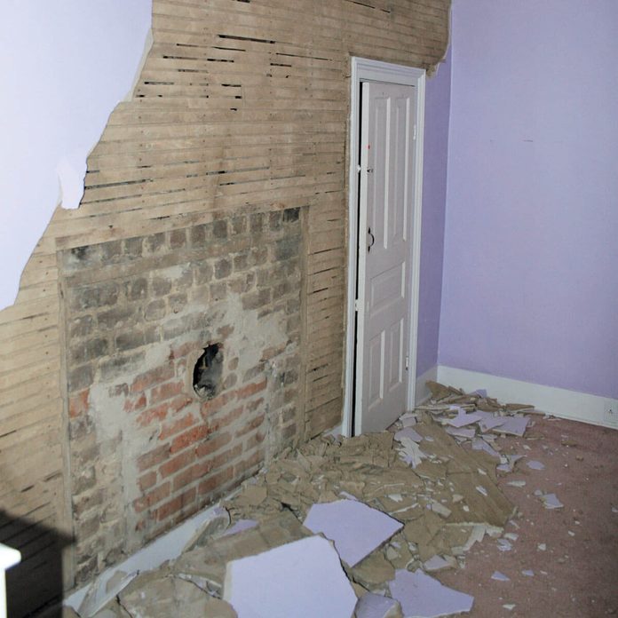 hidden fireplace behind plaster wall
