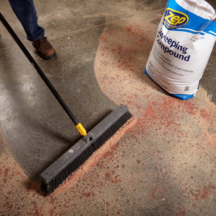 Sweeping up sweeping compound | Construction Pro Tips