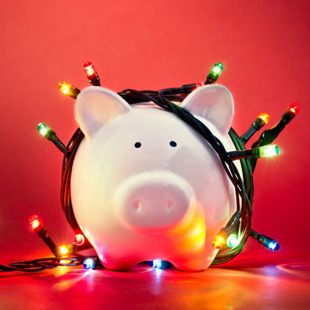 cost_158734355_01 led christmas lights saving money piggy bank money