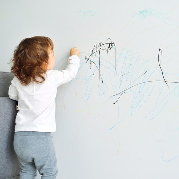 Kid drawing wall crayon marker