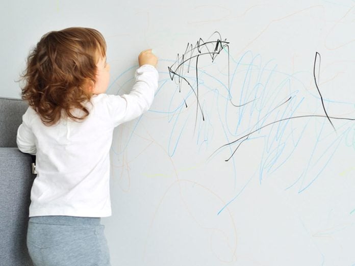 Kid drawing wall crayon marker