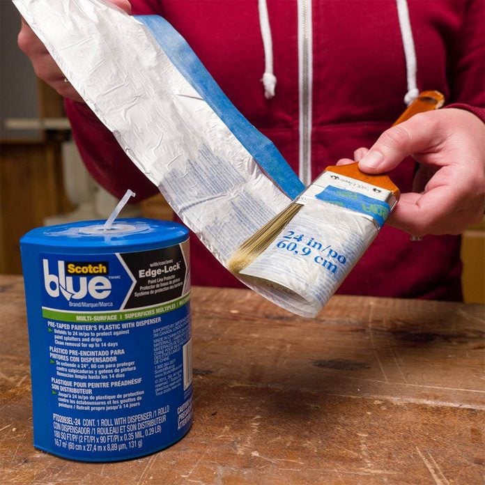 pre-taped plastic to protect paintbrushes