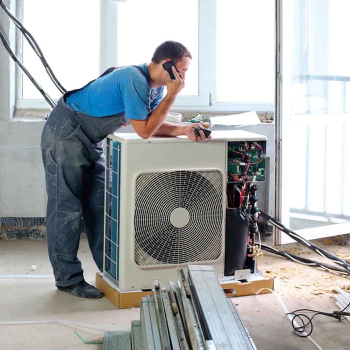 Shutterstock 159164966 air conditioner repair man hvac
