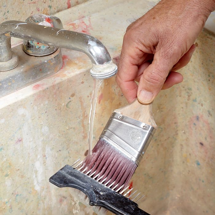 Combing through a paint brush | Construction Pro Tips