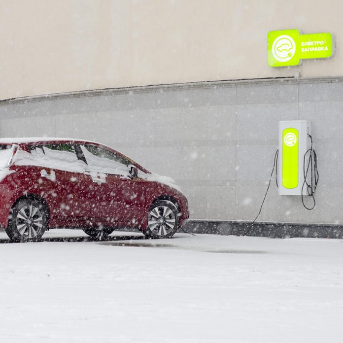 shutterstock_525884776 hybrid electric car charging station