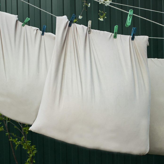 shutterstock_638110546 hang dry laundry pillow cases