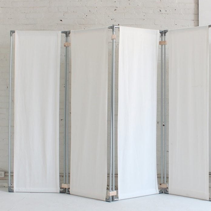 Fabric and Electrical Conduit Room Divider 