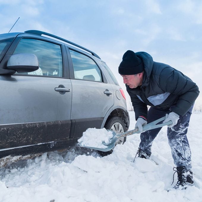 shovel-snow-stuck-car-winter-storm