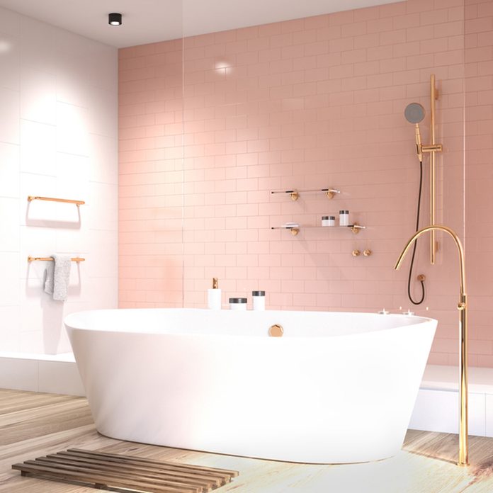 shutterstock_674465893 pink retro bathroom tile bathtub