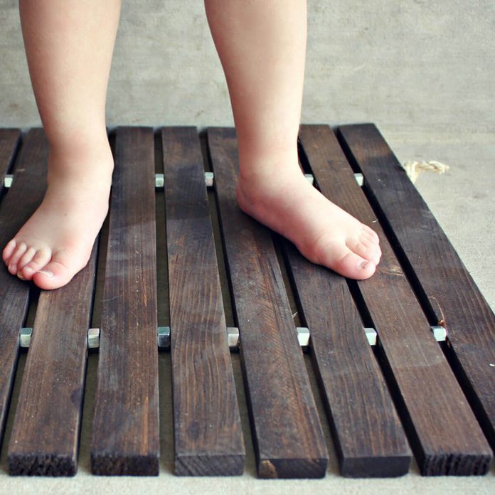 wood stake boot tray mat