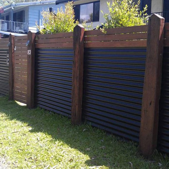 Wood and Corrugated Metal Fence 