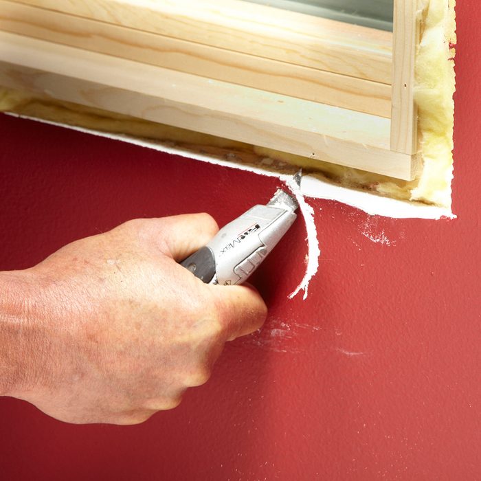 Cutting away drywall for better trim fits | Construction Pro Tips