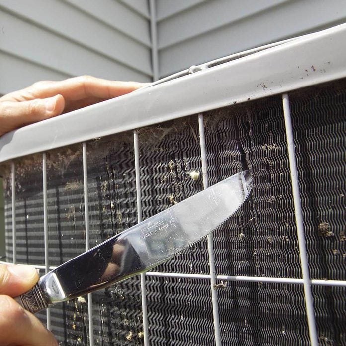 fixing ac fins with butter knife