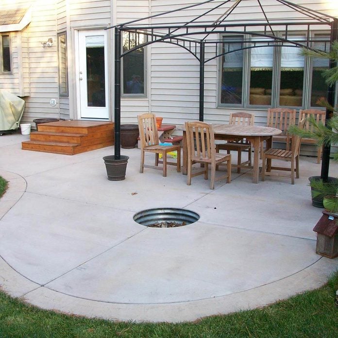 Concrete Patio with Fire Pit small backyard patio
