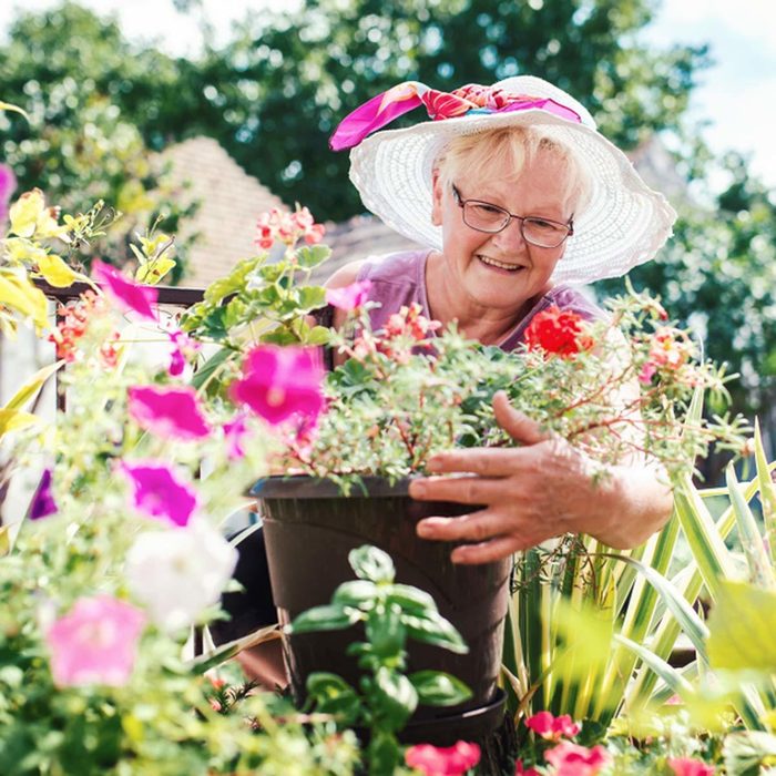 grandma in the garden gardening
