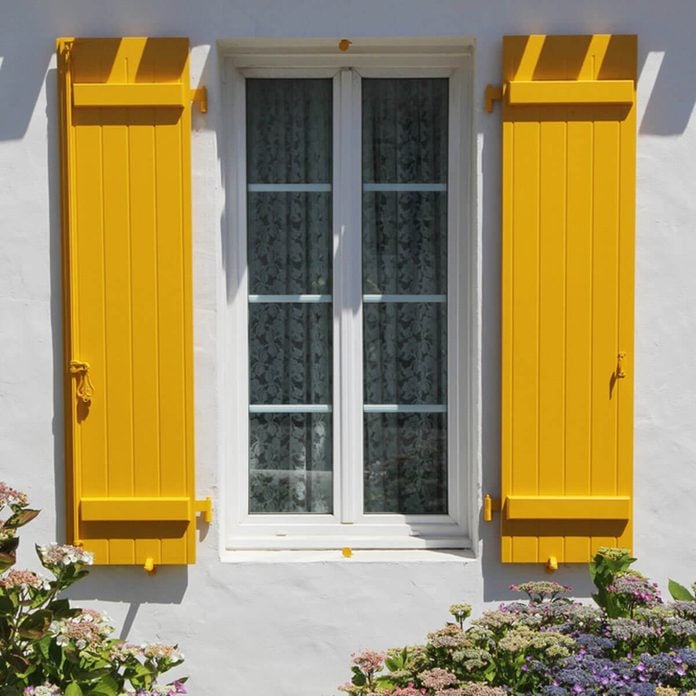 yellow window shutters