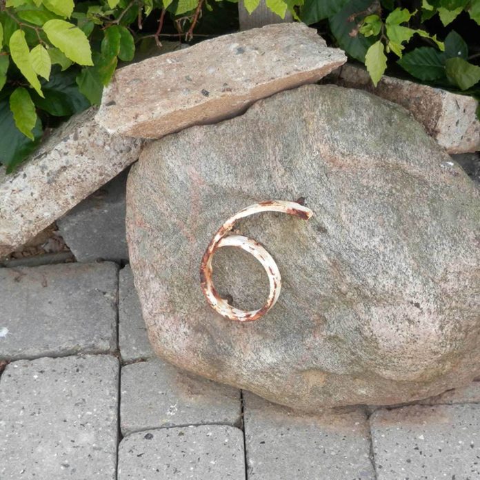 house numbers welded to a rock